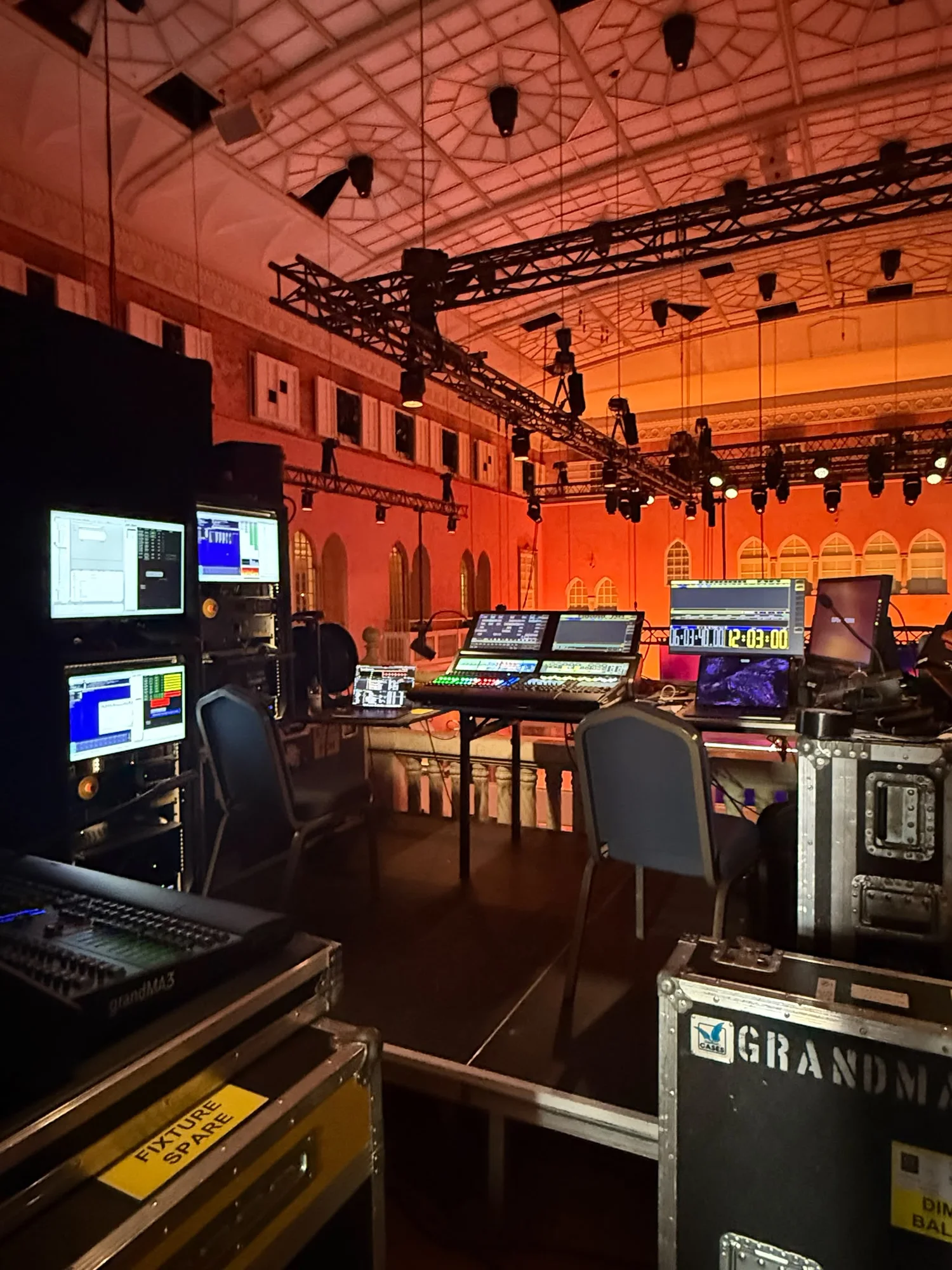 The front-of-house production desk and lighting console backstage
