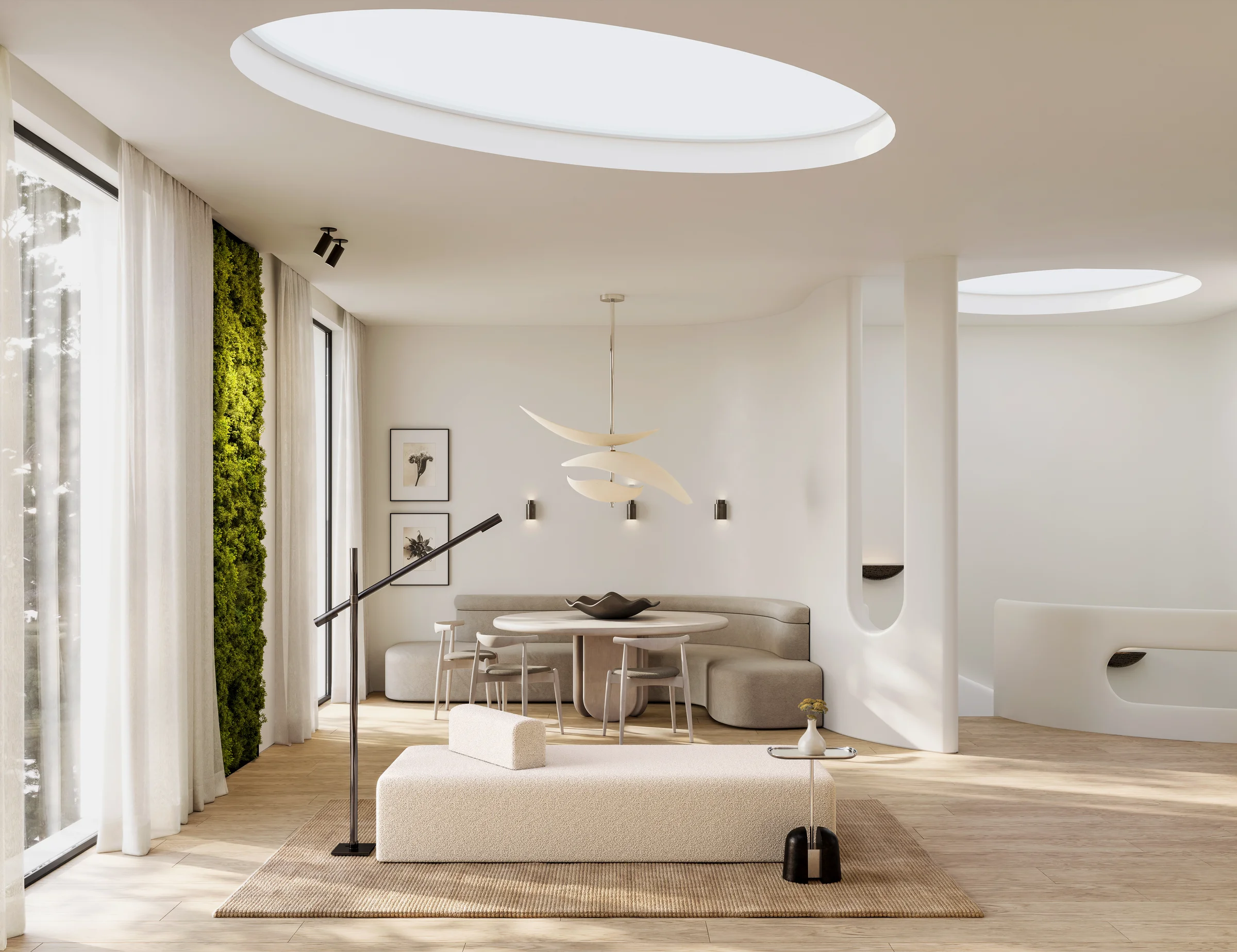 Round dining table beneath a sculptural swallow pendant, curved cream banquette and biophilic moss wall